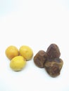 Fresh yellow dates and brown dates isolated on white background Royalty Free Stock Photo