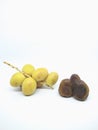 Fresh yellow dates and brown dates isolated on white background Royalty Free Stock Photo