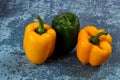 Fresh yellow and green capsicums Royalty Free Stock Photo