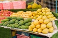 Fresh yellow and green mangoes at the fruit market stall Royalty Free Stock Photo