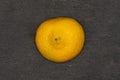 Fresh yellow lemon on grey stone Royalty Free Stock Photo