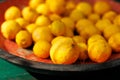 Fresh yellow lemons in rustic bowl Royalty Free Stock Photo