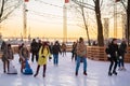 Saint Petersburg, Russia: a group of young people skate on the rink at Sevkabel Port.