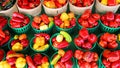 Fresh yellow, orange, green and red organic bell peppers Royalty Free Stock Photo