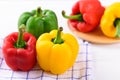 Fresh yellow, red and green bell peppers Royalty Free Stock Photo