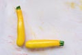 Fresh yellow squash on a pink background Royalty Free Stock Photo