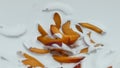 Fresh yogurt pieces apricot background close up. Fruity creamy dairy dessert.