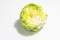 Fresh young cabbage, half a head isolated in white background Royalty Free Stock Photo