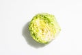 Fresh young cabbage, half a head isolated in white background Royalty Free Stock Photo