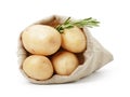 Fresh young potato in sack bag with rosemary Royalty Free Stock Photo