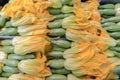 Fresh young zucchini with blossoms at market