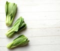 fresh and yummy green leaves Bok choy,Chinese cabbage ,small choy sum,on a white wooden