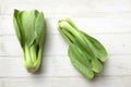 fresh and yummy green leaves Bok choy,Chinese cabbage ,small choy sum,on a white wooden Royalty Free Stock Photo