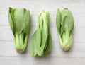 fresh and yummy green leaves Bok choy,Chinese cabbage ,small choy sum,on a white wooden