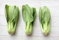 fresh and yummy green leaves Bok choy,Chinese cabbage ,small choy sum,on a white wooden