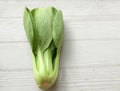 fresh and yummy green leaves Bok choy,Chinese cabbage ,small choy sum,on a white wooden Royalty Free Stock Photo