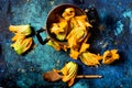 Fresh zucchini flowers inside vintage pan top view Royalty Free Stock Photo