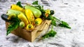 Fresh zucchini, green vegetables n a wooden box, freshly harvested courgette, summer squash. place for text Royalty Free Stock Photo