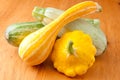 fresh zucchini and pattypan courgettes on display Royalty Free Stock Photo