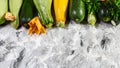 Fresh zucchini on wood. Organic vegetables on farmer market, courgette harvested in the summer. place for text Royalty Free Stock Photo