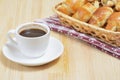 Freshened home croissants lie in a wicker basket Royalty Free Stock Photo