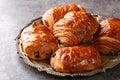 Freshly backed french traditional croissants chocolate petit pain au chocolat closeup in the plate. Horizontal Royalty Free Stock Photo