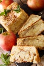 Freshly baked apple bread with cinnamon and mint close-up. vertical