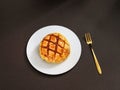 an apple pie sitting on top of a white plate next to a fork and knife Royalty Free Stock Photo