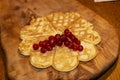 Freshly baked waffles with currants Toping