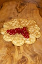 Freshly baked waffles with currants Toping