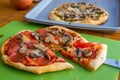 Freshly baked artisan pizza with fresh produce and cheese. Royalty Free Stock Photo