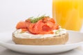 Freshly baked bagel with cream cheese, lox and orange juice Royalty Free Stock Photo