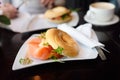 Freshly baked bagel with smoked salmon, cream cheese and arugula. Royalty Free Stock Photo