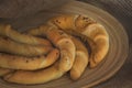 Freshly baked baguette-like rolls sprinkled with flax seeds and salt.