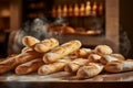 Freshly baked baguettes on counter in a french bakery shop, Steam rising from baked bread Royalty Free Stock Photo