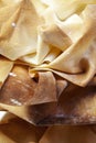 Freshly baked baskets of filo dough on a white plate. The basis for the dessert. Thin Balkan dough Royalty Free Stock Photo