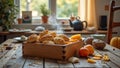 Freshly baked biscuits and fruit on rustic wooden table in cozy kitchen setting Royalty Free Stock Photo