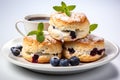 Freshly baked blueberry scones resting elegantly on a spotless white background Royalty Free Stock Photo
