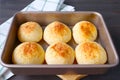 Freshly baked Brazilian cheese breads in a baking tray Royalty Free Stock Photo