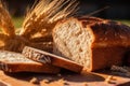 Freshly baked bread with ears of wheat on a natural background 1 Royalty Free Stock Photo