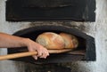 Freshly baked bread in old timey wood oven