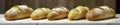 Freshly baked bread and pastries on a marble counter, marble, flour Royalty Free Stock Photo