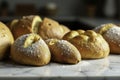 Freshly baked bread and pastries on a marble counter, presentation, freshly baked Royalty Free Stock Photo