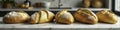 Freshly baked bread and pastries on a marble counter, counter, yeast, freshly baked Royalty Free Stock Photo