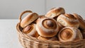 Freshly Baked Bread Rolls in a Woven Basket. Royalty Free Stock Photo