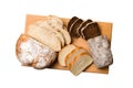 Freshly baked bread slices on cutting board isolated on white background . top view Sliced bread