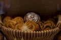 freshly baked bread in a wicker basket on a shop window. Royalty Free Stock Photo