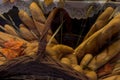 freshly baked bread in a wicker basket on a shop window. Royalty Free Stock Photo