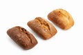 Freshly baked buns of different sorts wheat and rye isolated on white with shadow Royalty Free Stock Photo