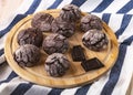 Freshly baked chocolate chip cookies and chocolate chips on a wooden tray. Chocolate pastry Royalty Free Stock Photo